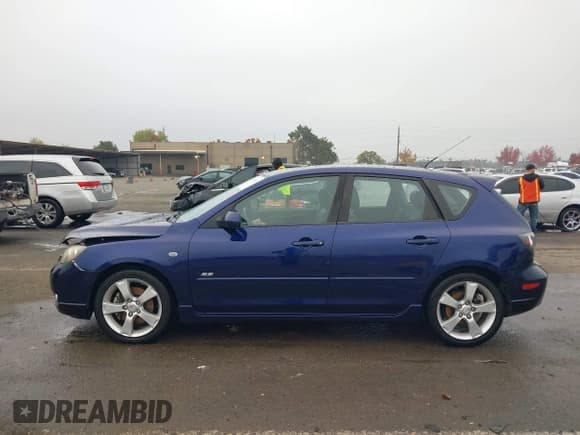 ✅ 2005 Mazda 3 s • VIN: JM1BK343251338770 • Lot: 43781259. Listed on IAAI with 133,372 mi. Free auction sales archive from the USA and detailed vehicle history report at DreamBid. Image 13.