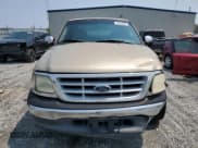 ✅ 1999 Ford F-150 • VIN: 1FTRX17W1XNB82405 • Lot: 59284925. Listed on Copart with 207,345 mi. Free auction sales archive from the USA and detailed vehicle history report at DreamBid. Image 5.