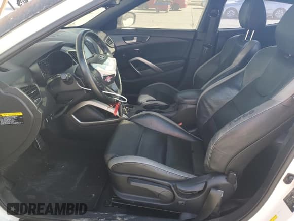 ✅ 2016 Hyundai Veloster Turbo • VIN: KMHTC6AE1GU271052 • Lot: 77515054. Listed on Copart with 112,419 mi. Free auction sales archive from the USA and detailed vehicle history report at DreamBid. Image 8.