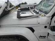 ✅ 2020 Jeep Wrangler Unlimited Sahara Altitude • VIN: 1C4HJXEN3LW162848 • Лот: 65244345. Опубликован ранее на Copart с пробегом Не указан. Бесплатный доступ к архиву аукционных продаж из США и подробный отчёт об истории автомобиля на DreamBid. Изображение 11.