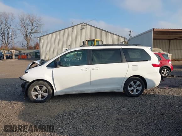 ✅ 2015 Toyota Sienna LE • VIN: 5TDKK3DC5FS576164 • Lot: 43730628. Listed on IAAI with 123,366 mi. Free auction sales archive from the USA and detailed vehicle history report at DreamBid. Image 14.
