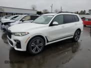 ✅ 2022 BMW X7 xDrive40i • VIN: 5UXCW2C04N9J14393 • Lot: 90445275. Listed on Copart with 86,111 mi. Free auction sales archive from the USA and detailed vehicle history report at DreamBid. Image 1.