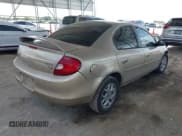 ✅ 2002 Dodge Neon ES • VIN: 1B3ES56C62D658479 • Lot: 42736769. Listed on IAAI with 70,443 mi. Free auction sales archive from the USA and detailed vehicle history report at DreamBid. Image 4.