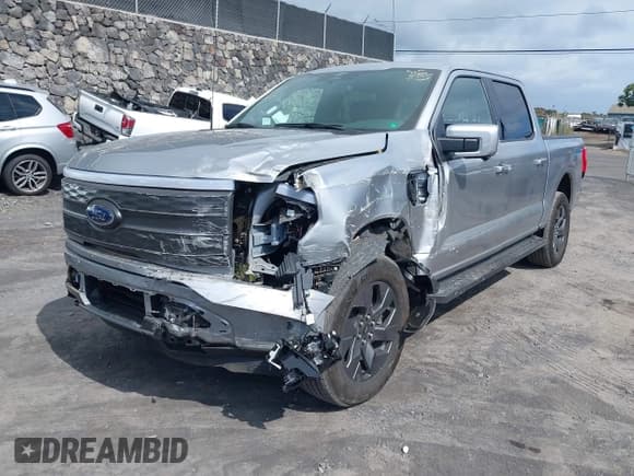 ✅ 2023 Ford F-150 Lightning Pro • VIN: 1FT6W1EV8PWG59244 • Lot: 42631226. Listed on IAAI with 13,682 mi. Free auction sales archive from the USA and detailed vehicle history report at DreamBid. Image 6.