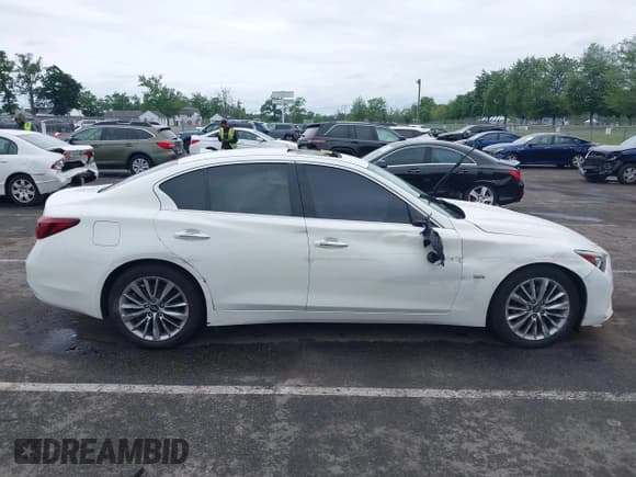 ✅ 2019 Infiniti Q50 Luxe • VIN: JN1EV7AP0KM519656 • Lot: 42604670. Wystawiony na IAAI z przebiegiem 118 126 mil. Bezpłatny archiwum sprzedaży aukcyjnych z USA i szczegółowy raport historii pojazdu na DreamBid. Zdjęcie 13.