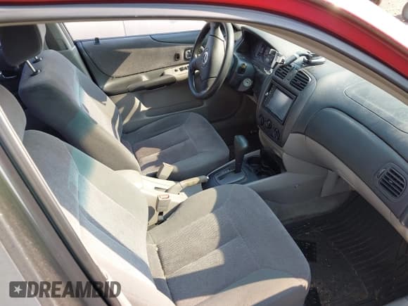 ✅ 2002 Mazda Protege DX • VIN: JM1BJ225520501057 • Lot: 42979132. Wystawiony na IAAI z przebiegiem 140 232 mil. Bezpłatny archiwum sprzedaży aukcyjnych z USA i szczegółowy raport historii pojazdu na DreamBid. Zdjęcie 5.