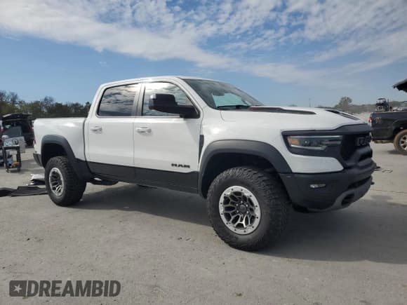 ✅ 2021 Ram 1500 TRX • VIN: 1C6SRFU95MN905991 • Lot: 89853675. Wystawiony na Copart z przebiegiem 10 080 mil. Bezpłatny archiwum sprzedaży aukcyjnych z USA i szczegółowy raport historii pojazdu na DreamBid. Zdjęcie 4.