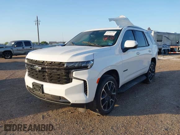 2023 Chevrolet Tahoe RST with VIN 1GNSKRKD4PR427153, listed as a IAAI auction lot 41906796 with 23,113 mi miles and . Bid and sale history available at DreamBid. Image 2.