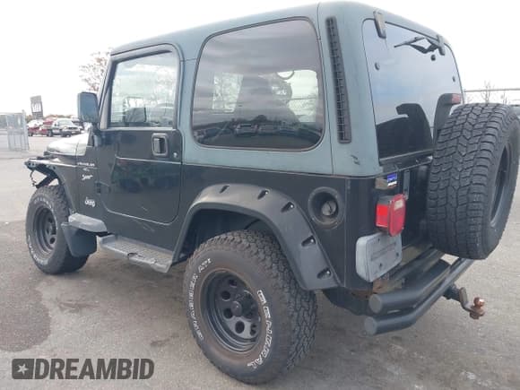✅ 2000 Jeep Wrangler Sport • VIN: 1J4FA49S8YP783696 • Lot: 43559467. Listed on IAAI with 132,396 mi. Free auction sales archive from the USA and detailed vehicle history report at DreamBid. Image 3.