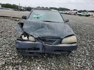 2005 Hyundai Elantra GLS z VIN KMHDN46D95U145649, wystawiony jako Copart lot #71177094 z przebiegiem 418 706 mil mil oraz Szkoda całkowita • Salvage title. Historia ofert i sprzedaży dostępna na DreamBid. Obrazek 5.