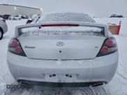 ✅ 2007 Hyundai Tiburon GT • VIN: KMHHN65F57U247209 • Лот: 85445885. Опубликован ранее на Copart с пробегом 137 418 миль. Бесплатный доступ к архиву аукционных продаж из США и подробный отчёт об истории автомобиля на DreamBid. Изображение 6.