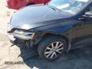 ✅ 2014 Volkswagen Jetta SE • VIN: 3VWD17AJ6EM380039 • Lot: 43098623. Listed on IAAI with 143,104 mi. Free auction sales archive from the USA and detailed vehicle history report at DreamBid. Image 13.