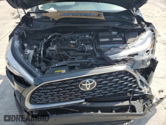 ✅ 2022 Toyota Corolla Cross XLE • VIN: 7MUDAAAG5NV031724 • Lot: 69848655. Wystawiony na Copart z przebiegiem 43 449 mil. Bezpłatny archiwum sprzedaży aukcyjnych z USA i szczegółowy raport historii pojazdu na DreamBid. Zdjęcie 12.