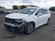 ✅ 2022 Chrysler Pacifica Hybrid Touring L • VIN: 2C4RC1L78NR122793 • Lot: 43696246. Listed on IAAI with 70,045 mi. Free auction sales archive from the USA and detailed vehicle history report at DreamBid. Image 20.