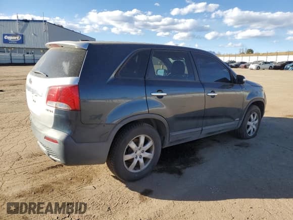 ✅ 2011 Kia Sorento LX • VIN: 5XYKTCA12BG002497 • Lot: 93890055. Listed on Copart with Not provided. Free auction sales archive from the USA and detailed vehicle history report at DreamBid. Image 3.
