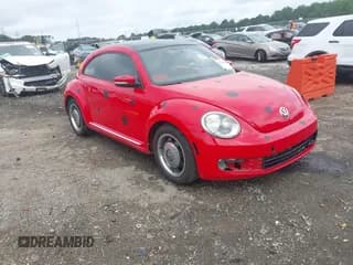 ✅ 2012 Volkswagen Beetle 2.5L • VIN: 3VWJX7AT4CM656279 • Lot: 42546902. Listed on IAAI with 183,665 mi. Free auction sales archive from the USA and detailed vehicle history report at DreamBid. Image 1.