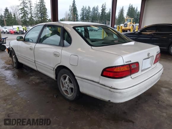 ✅ 1998 Toyota Avalon XL • VIN: 4T1BF18B5WU242038 • Лот: 41577342. Опубликован ранее на IAAI с пробегом 195 707 миль. Бесплатный доступ к архиву аукционных продаж из США и подробный отчёт об истории автомобиля на DreamBid. Изображение 3.