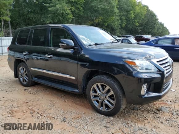 ✅ 2014 Lexus LX 570 • VIN: JTJHY7AX1E4147974 • Lot: 71250185. Listed on Copart with 117,524 mi. Free auction sales archive from the USA and detailed vehicle history report at DreamBid. Image 4.