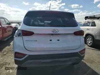 ✅ 2019 Hyundai Santa Fe SE • VIN: 5NMS23AD8KH010073 • Lot: 52181594. Wystawiony na Copart z przebiegiem 90 366 mil. Bezpłatny archiwum sprzedaży aukcyjnych z USA i szczegółowy raport historii pojazdu na DreamBid. Zdjęcie 6.