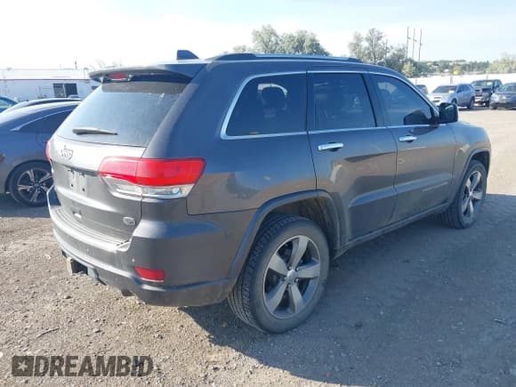 ✅ 2014 Jeep Grand Cherokee Overland • VIN: 1C4RJFCG2EC572628 • Lot: 42874326. Listed on IAAI with 129,145 mi. Free auction sales archive from the USA and detailed vehicle history report at DreamBid. Image 4.