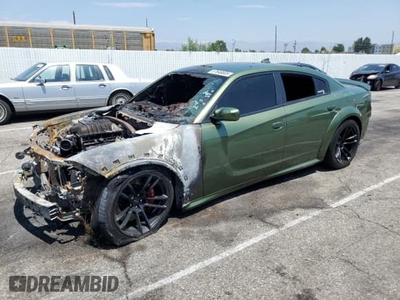 ✅ 2022 Dodge Charger SRT Hellcat Widebody • VIN: 2C3CDXL93NH116756 • Лот: 67646805. Опубликован ранее на Copart с пробегом Не указан. Бесплатный доступ к архиву аукционных продаж из США и подробный отчёт об истории автомобиля на DreamBid. Изображение 1.