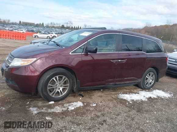 ✅ 2011 Honda Odyssey EX-L • VIN: 5FNRL5H66BB040169 • Лот: 43656959. Опубликован ранее на IAAI с пробегом 222 442 миль. Бесплатный доступ к архиву аукционных продаж из США и подробный отчёт об истории автомобиля на DreamBid. Изображение 14.