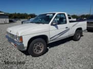 ✅ 1993 Nissan Frontier • VIN: 1N6SD11SXPC373247 • Lot: 91439985. Listed on Copart with 154,001 mi. Free auction sales archive from the USA and detailed vehicle history report at DreamBid. Image 1.
