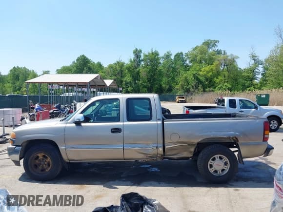 ✅ 2001 GMC Sierra 1500 SLE • VIN: 1GTEK19T31E271805 • Лот: 42167399. Опубликован ранее на IAAI с пробегом 206 202 миль. Бесплатный доступ к архиву аукционных продаж из США и подробный отчёт об истории автомобиля на DreamBid. Изображение 14.