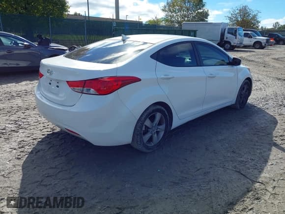 ✅ 2013 Hyundai Elantra GLS • VIN: 5NPDH4AE1DH262341 • Lot: 43441443. Listed on IAAI with 126,624 mi. Free auction sales archive from the USA and detailed vehicle history report at DreamBid. Image 4.