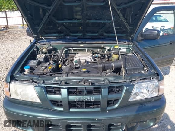 ✅ 2004 Isuzu Rodeo S • VIN: 4S2CK58Y544305012 • Lot: 43027958. Listed on IAAI with 125,526 mi. Free auction sales archive from the USA and detailed vehicle history report at DreamBid. Image 10.