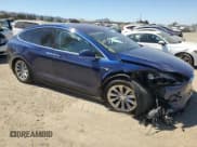 ✅ 2018 Tesla Model X 75D • VIN: 5YJXCBE23JF103458 • Лот: 69646965. Опубликован ранее на Copart с пробегом 99 232 миль. Бесплатный доступ к архиву аукционных продаж из США и подробный отчёт об истории автомобиля на DreamBid. Изображение 4.