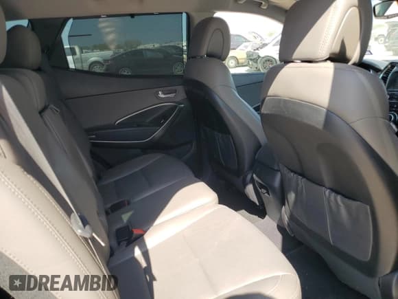 ✅ 2018 Hyundai Santa Fe 2.0T • VIN: 5XYZU4LAXJG548963 • Лот: 82633375. Опубликован ранее на Copart с пробегом 95 041 миль. Бесплатный доступ к архиву аукционных продаж из США и подробный отчёт об истории автомобиля на DreamBid. Изображение 11.