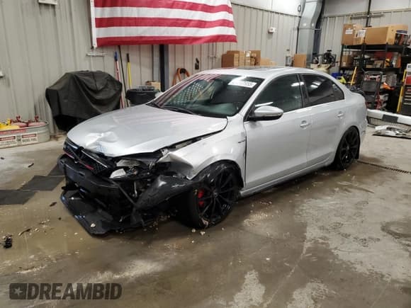 ✅ 2014 Volkswagen Jetta GLI • VIN: 3VW5T7AJ1EM302461 • Lot: 69777955. Listed on Copart with 123,303 mi. Free auction sales archive from the USA and detailed vehicle history report at DreamBid. Image 1.