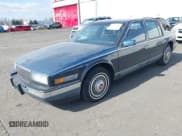 ✅ 1986 Cadillac Seville • VIN: 1G6KS6989GU813079 • Lot: 41732353. Listed on IAAI with Not provided. Free auction sales archive from the USA and detailed vehicle history report at DreamBid. Image 2.