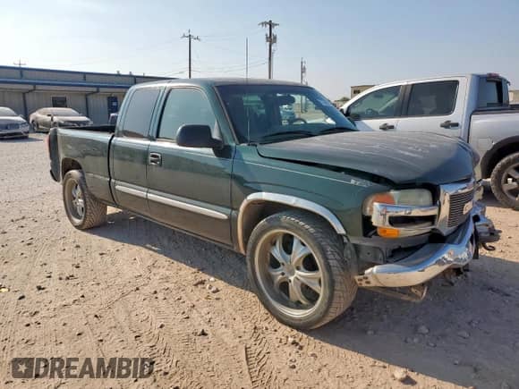 2004 GMC Sierra 1500 SLE with VIN 2GTEC19V641207813, listed as a Copart auction lot 71743215 with 208,365 mi miles and Salvage title. Bid and sale history available at DreamBid. Image 4.