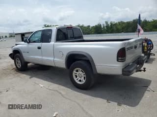 ✅ 2002 Dodge Dakota • VIN: 1B7GG12X92S697122 • Lot: 56000975. Wystawiony na Copart z przebiegiem 151 012 mil. Bezpłatny archiwum sprzedaży aukcyjnych z USA i szczegółowy raport historii pojazdu na DreamBid. Zdjęcie 2.