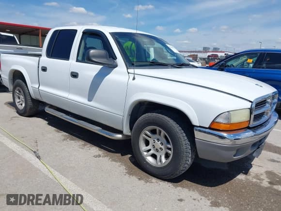 ✅ 2003 Dodge Dakota SLT • VIN: 1D7HL48X73S126440 • Lot: 42330513. Wystawiony na IAAI z przebiegiem 223 959 mil. Bezpłatny archiwum sprzedaży aukcyjnych z USA i szczegółowy raport historii pojazdu na DreamBid. Zdjęcie 1.