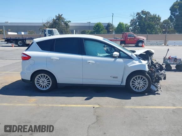 ✅ 2016 Ford C-Max SEL • VIN: 1FADP5CUXGL101893 • Лот: 42789782. Опубликован ранее на IAAI с пробегом 68 073 миль. Бесплатный доступ к архиву аукционных продаж из США и подробный отчёт об истории автомобиля на DreamBid. Изображение 13.