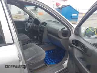 2001 Hyundai Santa Fe GLS z VIN KM8SC83DX1U054408, wystawiony jako IAAI lot #41498025 z przebiegiem 159 366 mil mil oraz . Historia ofert i sprzedaży dostępna na DreamBid. Obrazek 5.