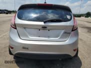 ✅ 2014 Ford Fiesta S • VIN: 3FADP4TJ9EM131799 • Lot: 62911165. Listed on Copart with 64,732 mi. Free auction sales archive from the USA and detailed vehicle history report at DreamBid. Image 6.