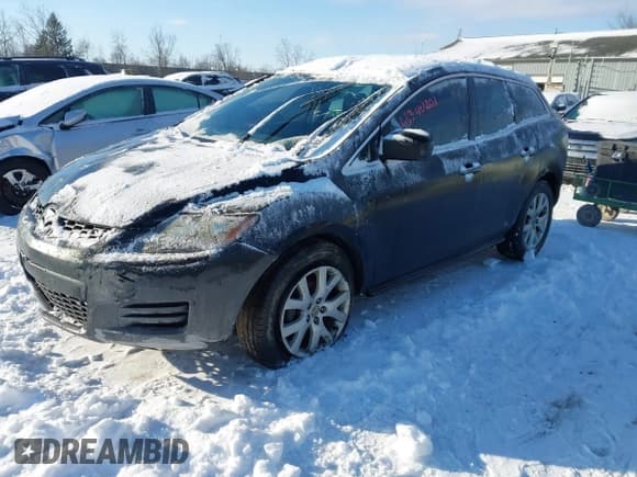 ✅ 2009 Mazda CX-7 Grand Touring • VIN: JM3ER29L590233851 • Лот: 41340201. Опубликован ранее на IAAI с пробегом 174 395 миль. Бесплатный доступ к архиву аукционных продаж из США и подробный отчёт об истории автомобиля на DreamBid. Изображение 2.