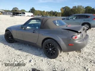 ✅ 2006 Mazda MX-5 Miata Grand Touring • VIN: JM1NC25F260121725 • Lot: 82727925. Wystawiony na Copart z przebiegiem 143 748 mil. Bezpłatny archiwum sprzedaży aukcyjnych z USA i szczegółowy raport historii pojazdu na DreamBid. Zdjęcie 2.