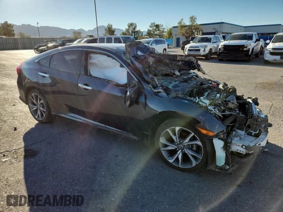 ✅ 2019 Honda Civic Touring • VIN: JHMFC1F9XKX002179 • Lot: 82468015. Listed on Copart with Not provided. Free auction sales archive from the USA and detailed vehicle history report at DreamBid. Image 4.