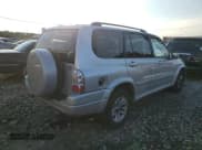 ✅ 2004 Suzuki XL7 LX • VIN: JS3TX92V044112500 • Lot: 63123754. Listed on Copart with 190,806 mi. Free auction sales archive from the USA and detailed vehicle history report at DreamBid. Image 3.