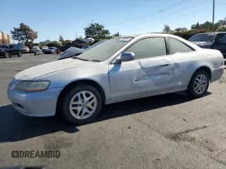 2002 Honda Accord EX с VIN 1HGCG22572A023495, выставлен на аукционе Copart как лот 71308015 с пробегом 177 408 миль миль и Списание • Salvage title. История ставок и продаж доступна на DreamBid. Изображение 1.
