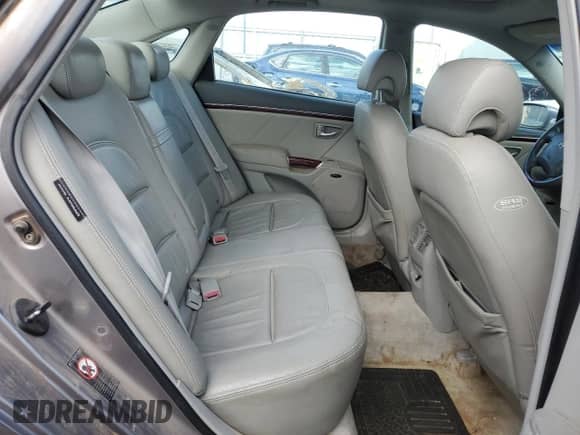 2007 Hyundai Azera SE с VIN KMHFC46F47A166915, выставлен на аукционе Copart как лот 88978785 с пробегом Не указан миль и Списание • Salvage title. История ставок и продаж доступна на DreamBid. Изображение 10.