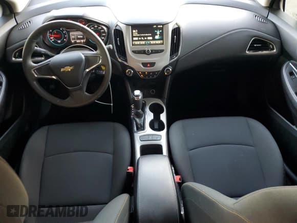 ✅ 2018 Chevrolet Cruze LS • VIN: 1G1BC5SM7J7134731 • Lot: 82364625. Listed on Copart with 84,754 mi. Free auction sales archive from the USA and detailed vehicle history report at DreamBid. Image 8.