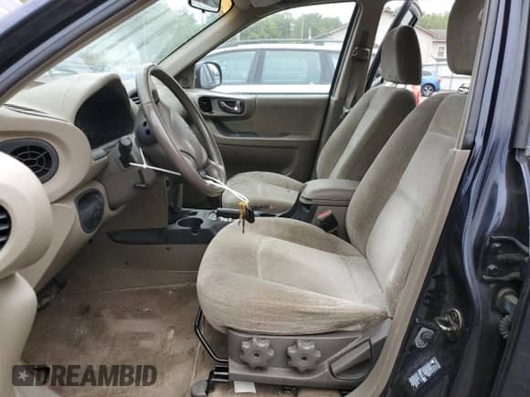 2004 Hyundai Santa Fe GLS z VIN KM8SC73DX4U770675, wystawiony jako Copart lot #70331224 z przebiegiem 134 785 mil mil oraz Czysty tytuł • Clean title. Historia ofert i sprzedaży dostępna na DreamBid. Obrazek 7.