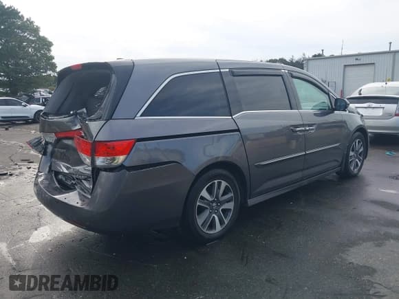 ✅ 2015 Honda Odyssey Touring Elite • VIN: 5FNRL5H9XFB041101 • Лот: 43063363. Опубликован ранее на IAAI с пробегом 162 011 миль. Бесплатный доступ к архиву аукционных продаж из США и подробный отчёт об истории автомобиля на DreamBid. Изображение 4.