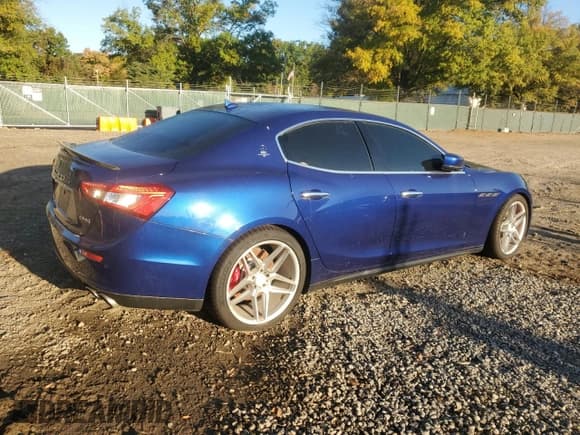 ✅ 2015 Maserati Ghibli S Q4 • VIN: ZAM57RTA8F1140189 • Lot: 82389575. Listed on Copart with 54,087 mi. Free auction sales archive from the USA and detailed vehicle history report at DreamBid. Image 3.